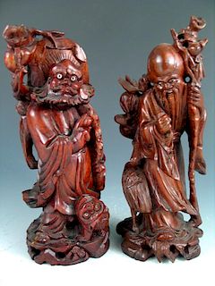 Two Chinese wood carvings.