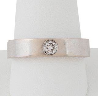 DIAMOND SOLITAIRE AND 14K WHITE GOLD BAND RING