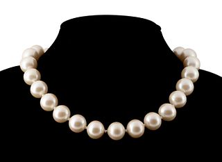 STRAND OF CREAM CULTURED PEARLS W/ CRYSTAL CLASP