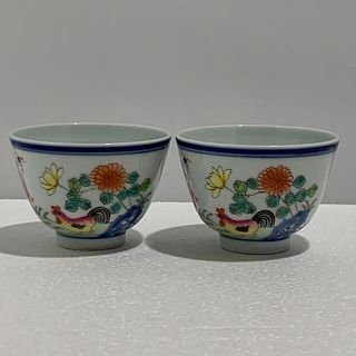 Pair of Chinese famille vert chicken cups