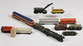 (12) LIONEL 'O' GAUGE TOY TRAIN ENGINES & CARS
