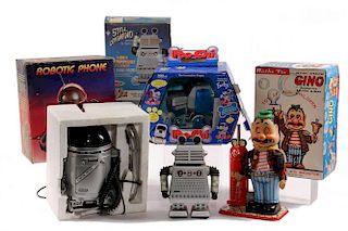 (4) THEMED ROBOT TOYS IN BOXES