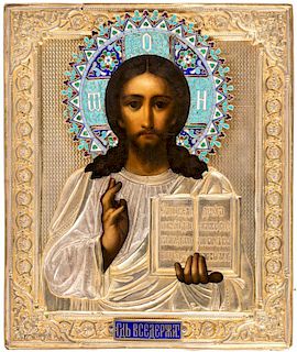 A RUSSIAN ICON OF CHRIST PANTOCRATOR IN A GILT SILVER AND ENAMEL OKLAD, MARKED SG, 1890S