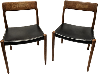 Two MCM Moller dining chairs 