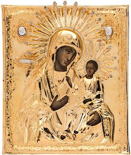 A RUSSIAN ICON OF THE IVERSKAYA MOTHER OF GOD IN A GILT SILVER OKLAD