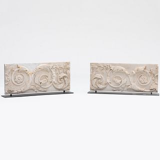 Two Foliate Scrolled Carved Marble Relief Plaques