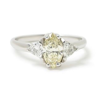 14K WHITE GOLD DIAMOND RING, 2.00 dwt., 1.03ct.TW OVAL UV VS2 Center Diamond .50ct.TW TRIANGLE Diamonds Size8.00