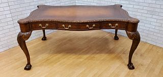 GEORGIAN STYLE BALL AND CLAW DESK WITH TOOLED LEATHER TOP