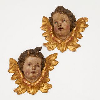 Pair Continental Baroque carved giltwood Amorini