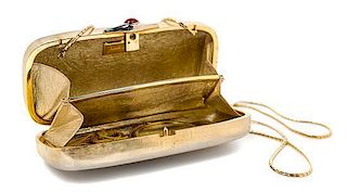 A Judith Leiber Brushed Goldtone Minaudiere, 7" x 3" x 1.5".