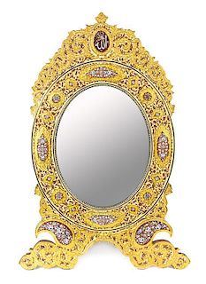 * A Persian Gilt Bronze Mounted and Enameled Table Mirror Height 33 1/4 x width 22 5/8 inches.