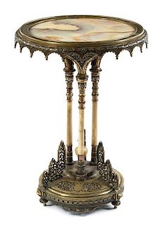 * A Middle Eastern Brass and Onyx Table Height 31 x diameter of top 21 1/2 inches.