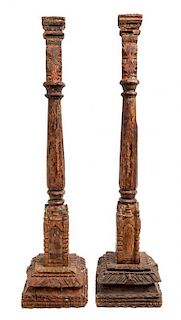 * A Near Pair of Indian Painted Wood Prickets Height 34 3/4 inches.