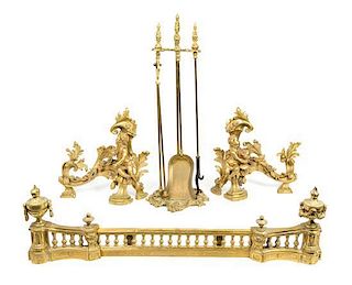 * A Pair of Rococo Style Gilt Metal Figural Chenets Height of fireplace tool stand 28 inches.