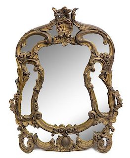 * A Rococo Style Giltwood Mirror Height 35 x width 25 inches.