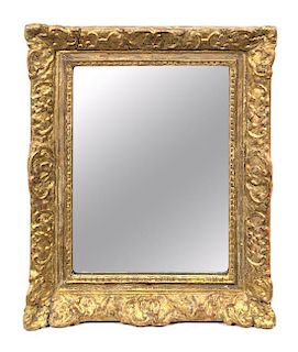 A Regence Giltwood Mirror Height 20 1/4 x width 17 inches.