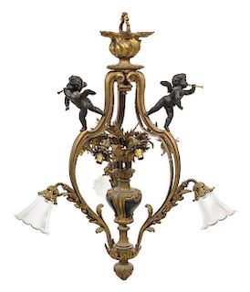 A Louis XV Style Gilt Bronze Nine-Light Chandelier Height 37 1/2 inches.