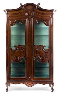 A Louis XV Provincial Style Armoire Height 97 x width 52 x depth 15 inches.