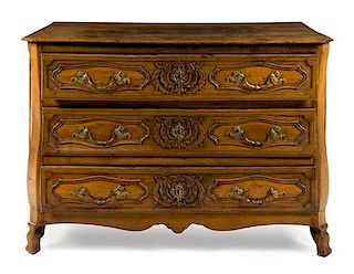 A Louis XV Provincial Style Commode Height 35 1/2 x width 51 x depth 26 3/4 inches.