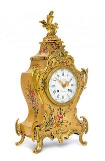 A Louis XV Style Gilt Bronze Mounted Painted Mantel Clock Height 14 inches.