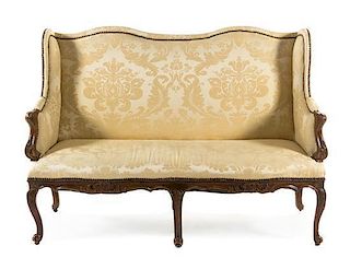 * A Louis XV Style Wingback Sofa Width 58 1/2 inches.