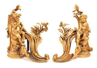 * A Pair of Louis XV Style Gilt Bronze Chenets Height 14 1/4 inches.