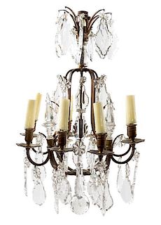 * A French Gilt Bronze Eight-Light Chandelier Height 29 inches.