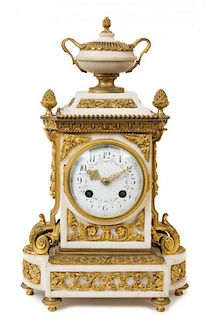 * A Louis XVI Style Gilt Bronze Mounted Marble Mantel Clock Height 13 1/2 inches.