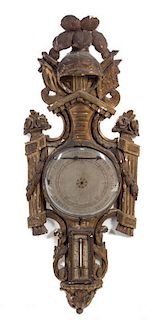 * A Louis XVI Giltwood Barometer Height 39 1/2 inches.