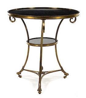 A Neoclassical Bronze and Marble Gueridon Height 29 x diameter of top 27 3/8 inches.
