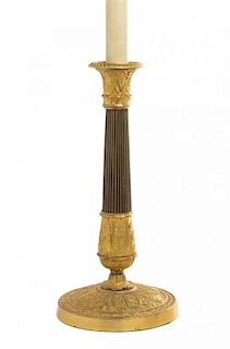 An Empire Style Gilt Bronze Candlestick Height overall 27 inches.