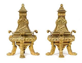 A Pair of French Gilt Bronze Chenets Height 20 5/8 inches.