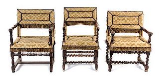 * Three Associated Italian Baroque Walnut Armchairs Height of tallest 38 inches.
