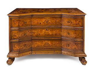 * An Italian Baroque Walnut and Marquetry Chest of Drawers Height 36 x width 55 1/2 x depth 28 inches.
