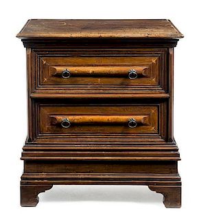 * An Italian Walnut Chest of Drawers Height 31 1/2 x width 29 1/2 x depth 17 3/4 inches.