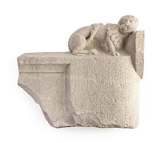 * A Spanish Carved Stone Corbel Fragment Height 19 3/4 x width 22 1/8 inches.