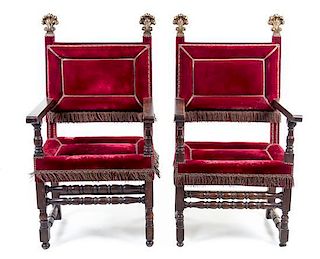 * A Pair of Spanish Baroque Walnut Armchairs Height 51 inches.