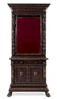 A Renaissance Revival Carved Walnut Cabinet Height 84 1/2 x width 36 x depth 22 inches.