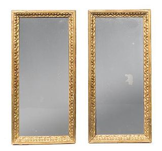 * A Pair of Continental Giltwood Mirrors Height 21 1/2 x width 10 1/4 inches.