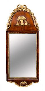 A Continental Parcel Gilt Burlwood Mirror Height 35 1/2 x 14 inches.