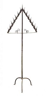 * A Continental Iron Torchere Height 67 inches.