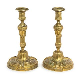 A Pair of Neoclassical Style Gilt Metal Candlesticks Height 10 3/4 inches.