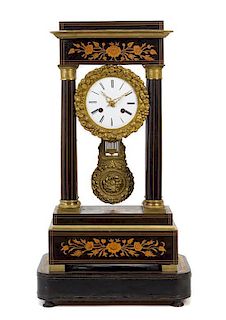 A Continental Marquetry Portico Clock Height 22 1/2 inches.
