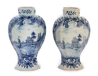A Pair of Delft Vases Height 8 3/8 inches.