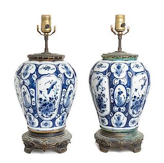 * A Pair of Delft Jars Height 17 1/4 inches.