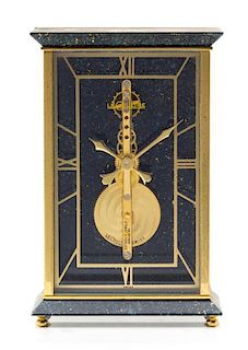 A Jaeger-LeCoultre Brass Desk Clock Height 4 3/4 x width 3 1/8 x depth 1 3/4 inches.
