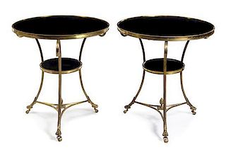 * A Pair of Neoclassical Brass Gueridons Height 29 x diameter of top 26 1/2 inches.