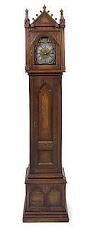 * A Continental Gothic Revival Oak Tall Case Clock Height 91 1/2 inches.