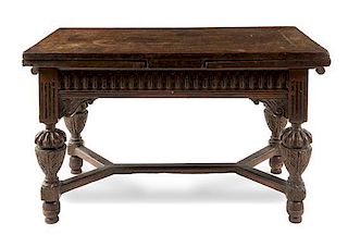 * A Jacobean Style Oak Table Height 33 x width 54 1/2 x depth 29 1/4 inches.