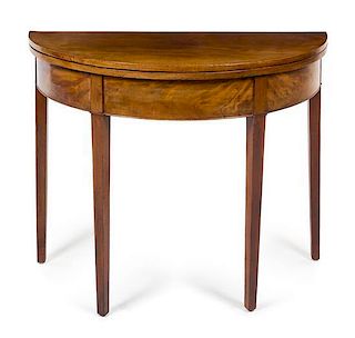 * A George III Style Mahogany Game Table Height 20 1/2 x width 36 1/2 x depth 16 1/2 inches (closed).